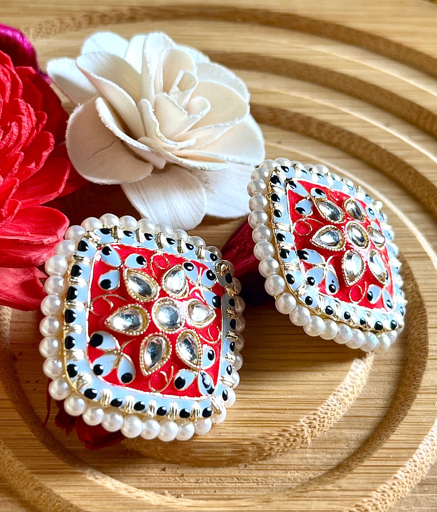 RED NITI STUDS