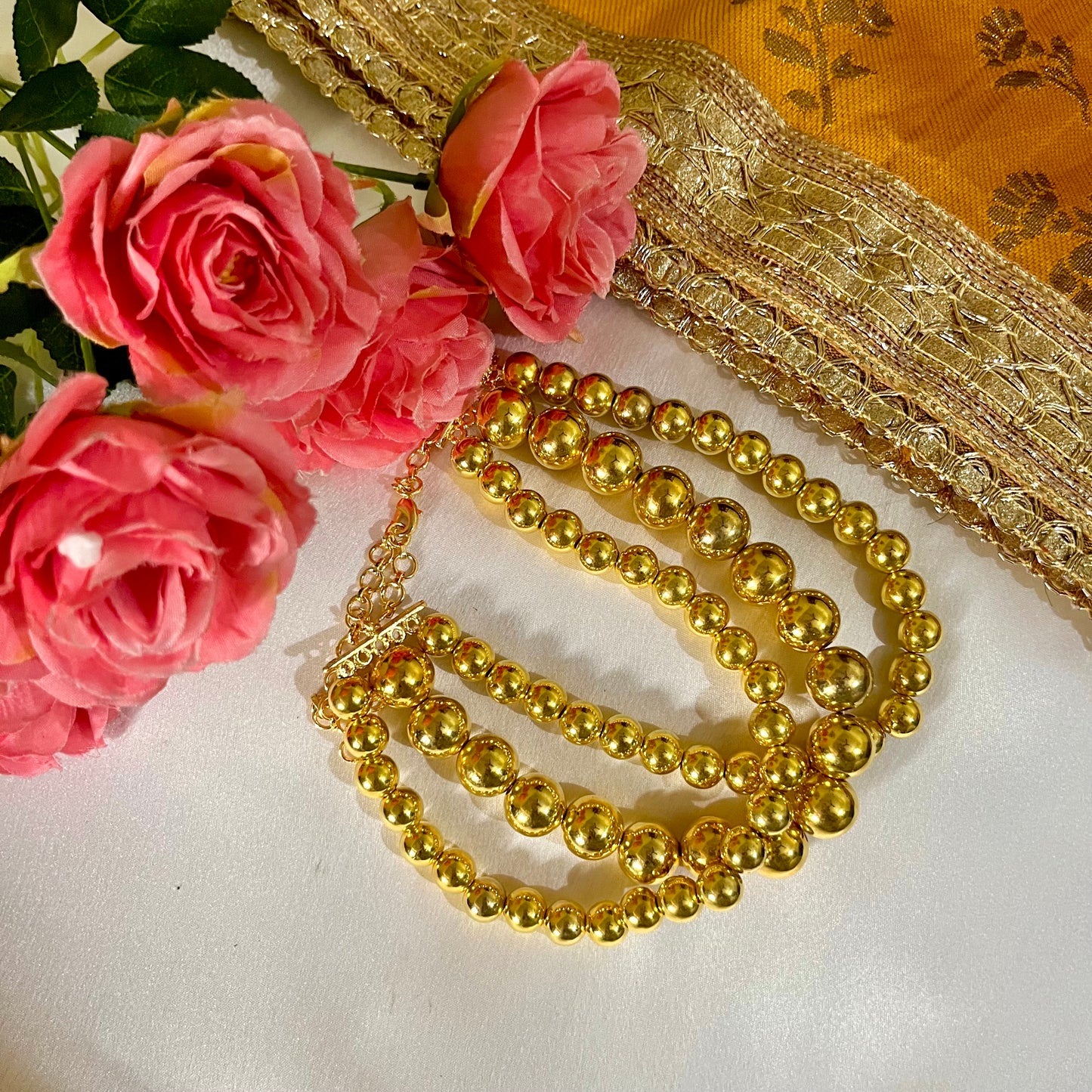 GOLD BEAD NECKPIECE