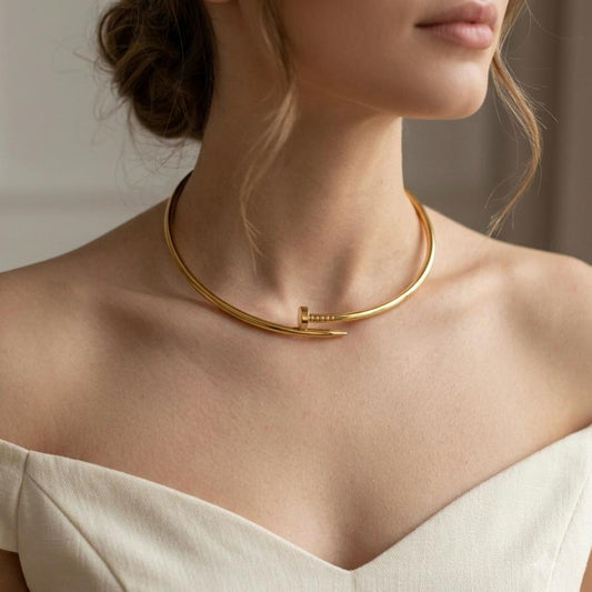 GOLD NAIL NECKPIECE